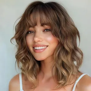 Nnzes Short Blonde Wigs with Bangs for Women Bob Synthetic Natural Shoulder Length Wavy Heat Resistant Hair for Daily Party Use